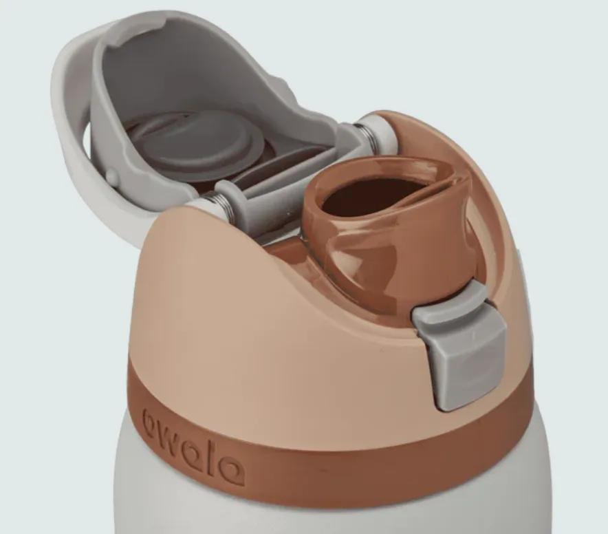 Close-up of Owala FreeSip lid showing dual drinking options: built-in straw and open chug spout with flip-top cover, highlighting leak-proof design.